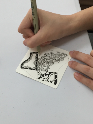 Participand experiencing Zentangle drawing